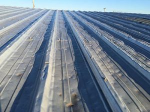 Commercial damaged Metal roof repair